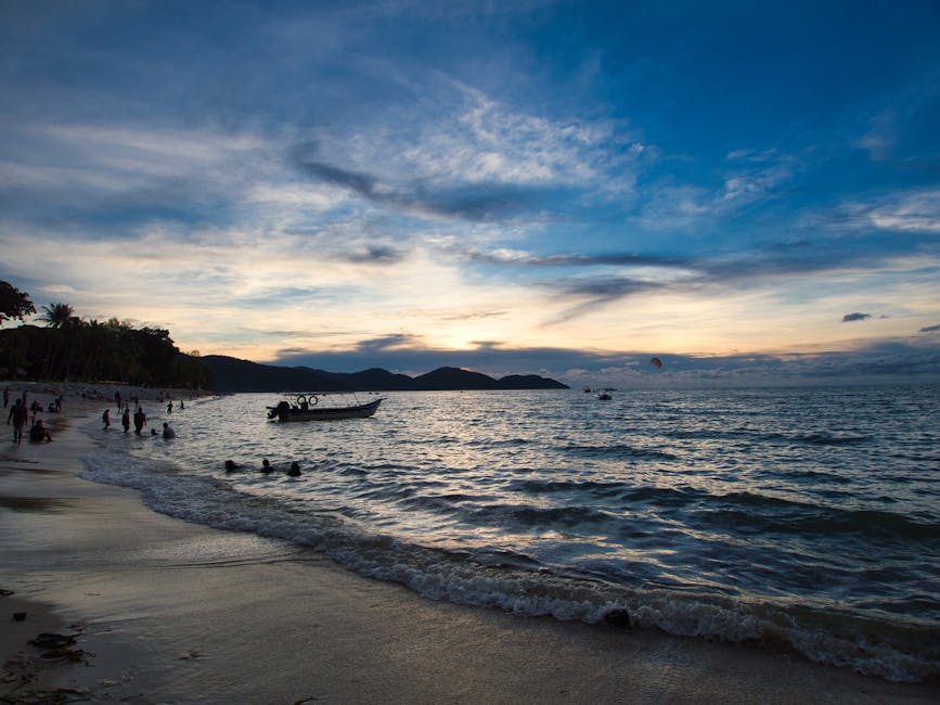 Batu Feringghi beach Penang sunset golden hour coastal road Malaysia