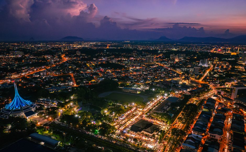 Kuching Sarawak waterfront night skyline aerial view Malaysia festive