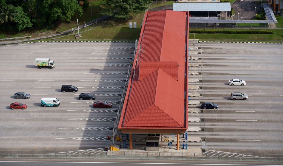 Malaysian highway expressway overhead toll gantry PLUS highway aerial view Peninsular Malaysia