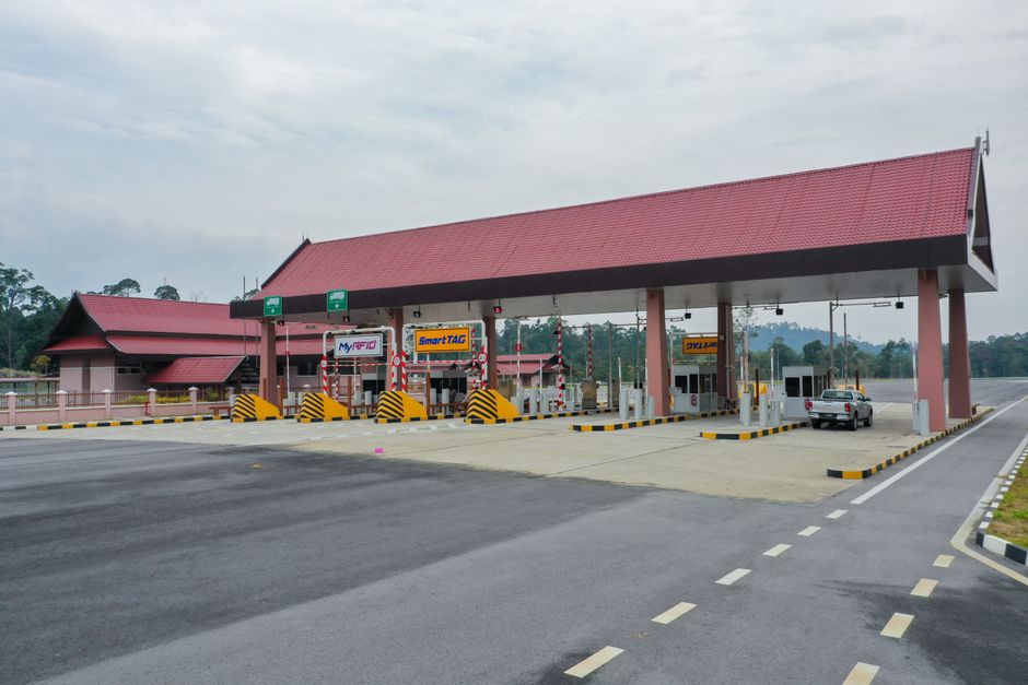 Malaysian toll plaza ground level SmartTAG RFID myRFID lane signage barrier highway