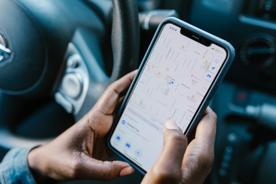 person checking car rental booking on smartphone Malaysia urban background