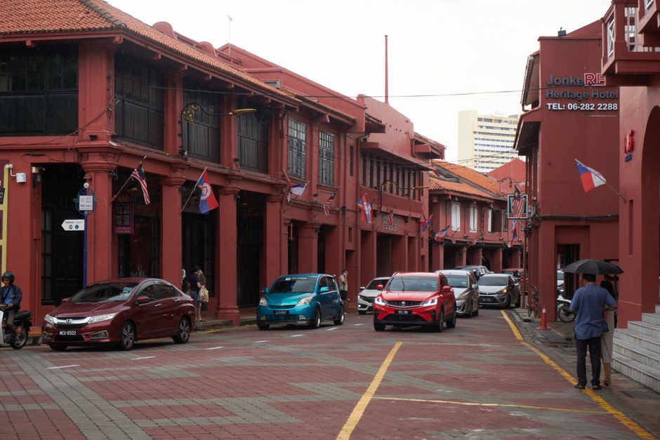 Melaka Jonker Street heritage shophouses colourful facades daytime Malaysia