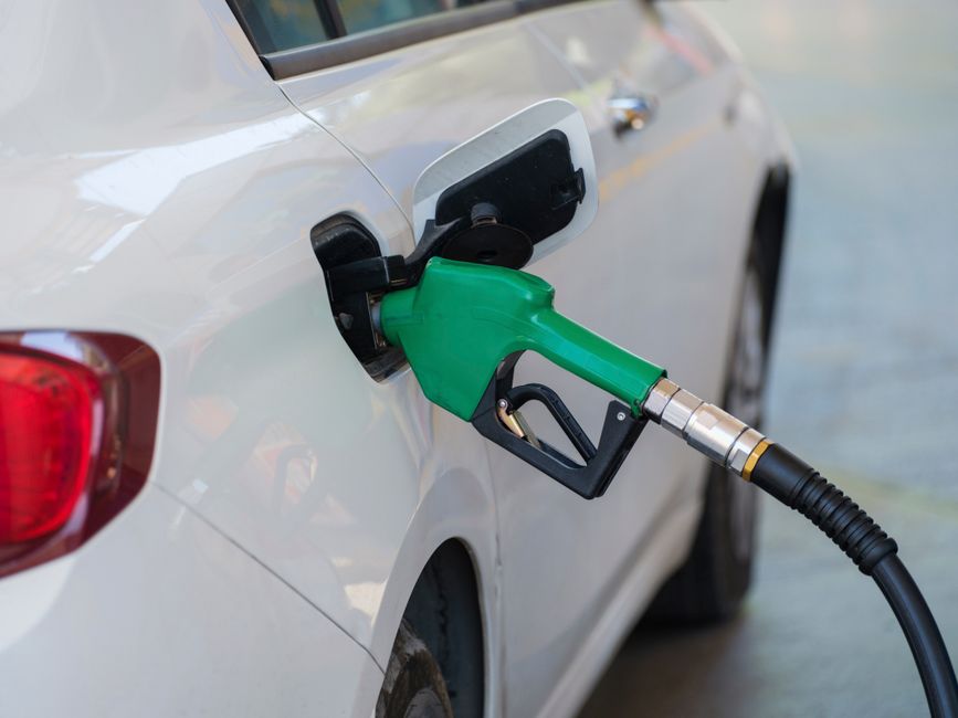 Petronas petrol station pump refuelling a car Malaysia