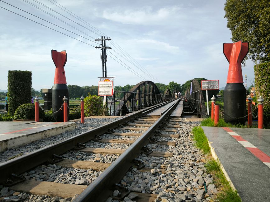 Bridge on the River Kwai Kanchanaburi Thailand historic railway bridge wooden spans tropical green hills