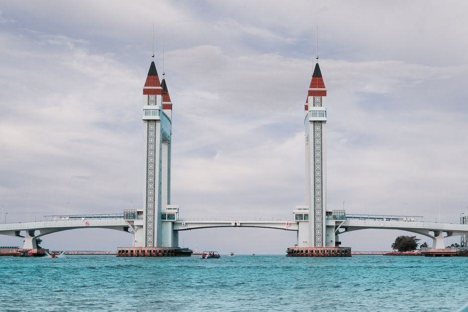 Kuala Terengganu waterfront city skyline with boats on South China Sea Malaysia