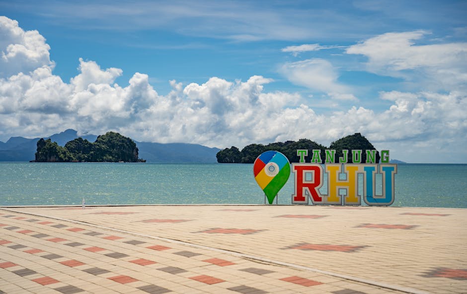 Tanjung Rhu beach sign Langkawi Malaysia turquoise water white sand mangroves