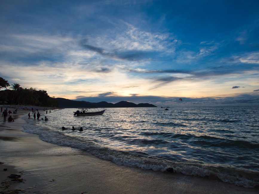 Batu Ferringhi beach Penang sunset coastline palm trees