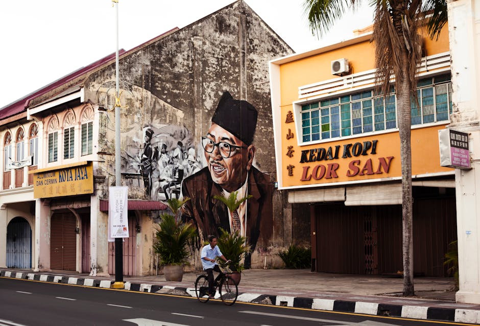 Ipoh old town heritage street murals painted walls bicycles Malaysia