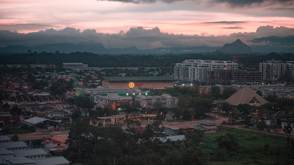 Kuching waterfront Sarawak River shophouses sunset aerial view Malaysia